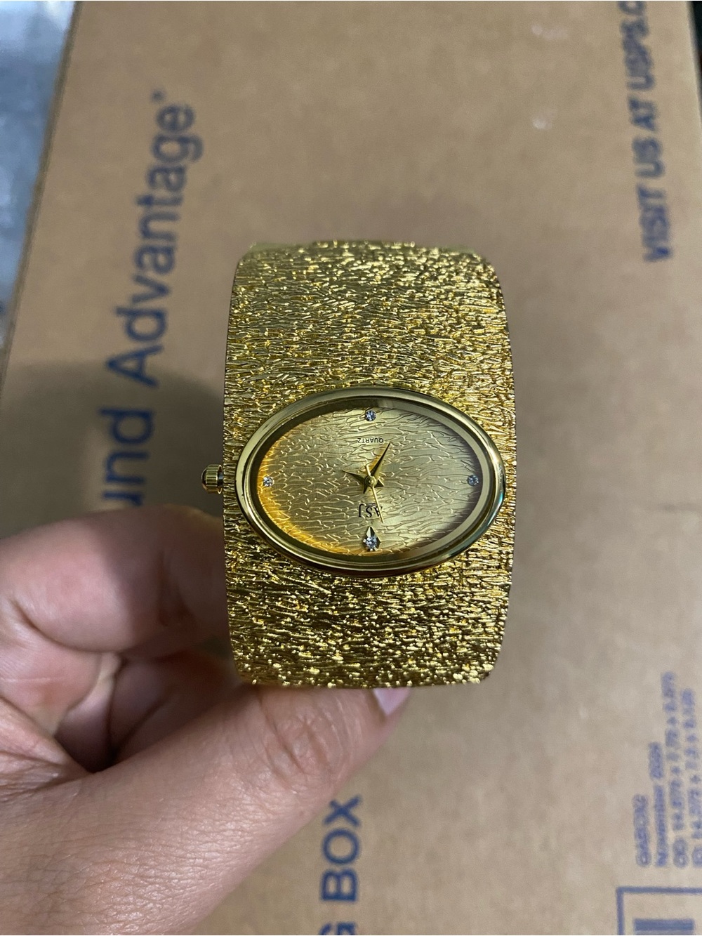 Gold Textured Oval Accent Cuff Bracelet